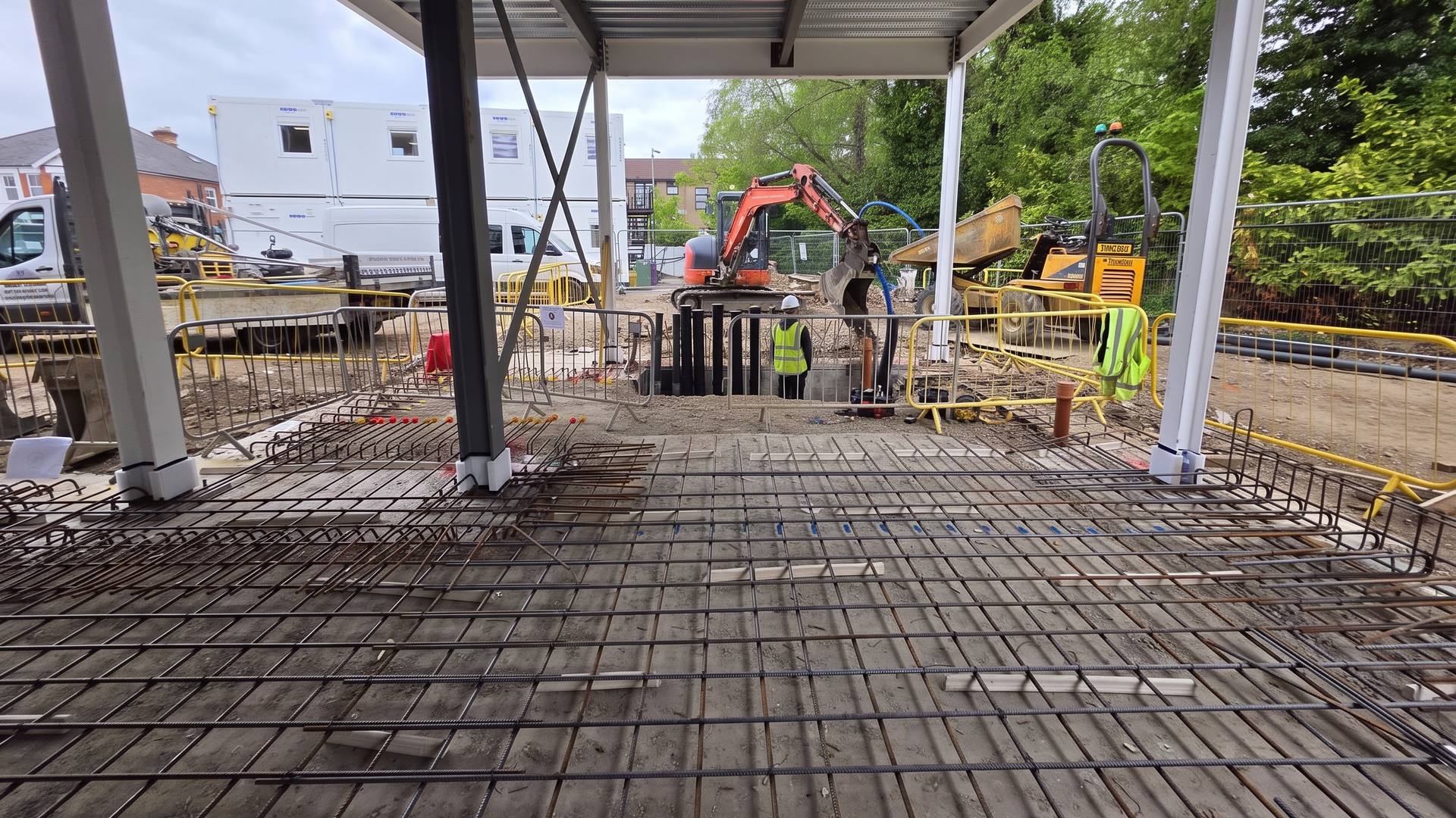 Reinforcement mesh on a deck beneath a steel canopy