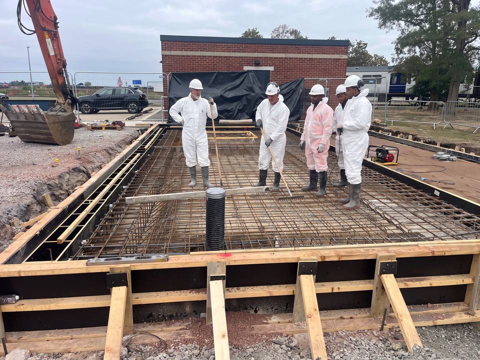 Reinforcement mesh inside timber formwork, ready to pour