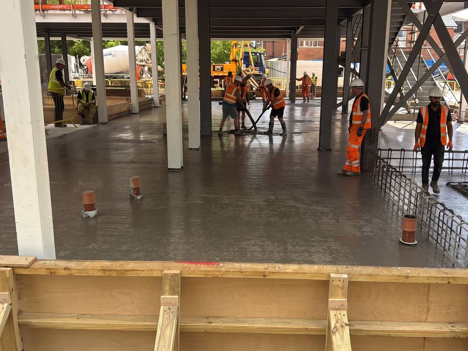 Ground floor slab pour inside a steel frame