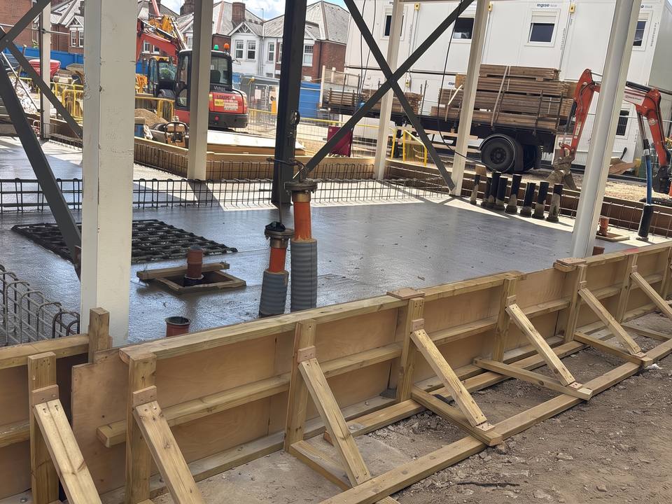 Slab reinforcement and edge formwork under a steel frame